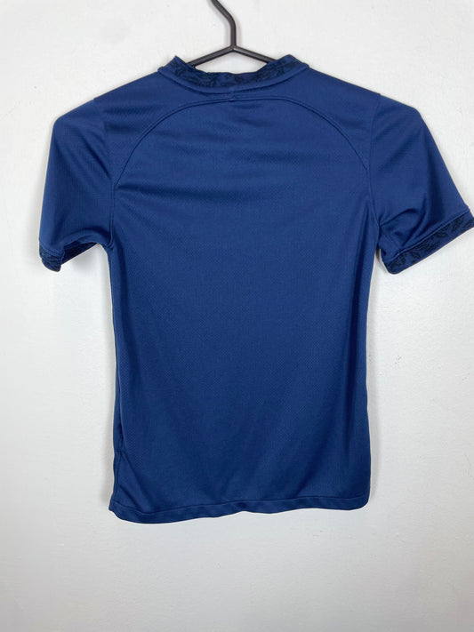 Back view of Nike France home shirt 2022/23 kids size showing blue design and Nike logo