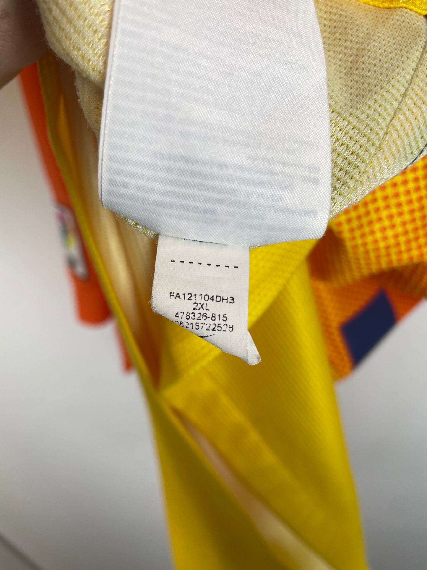 Nike size tag and fabric care label detail on Barcelona 12/13 Messi away shirt XXL