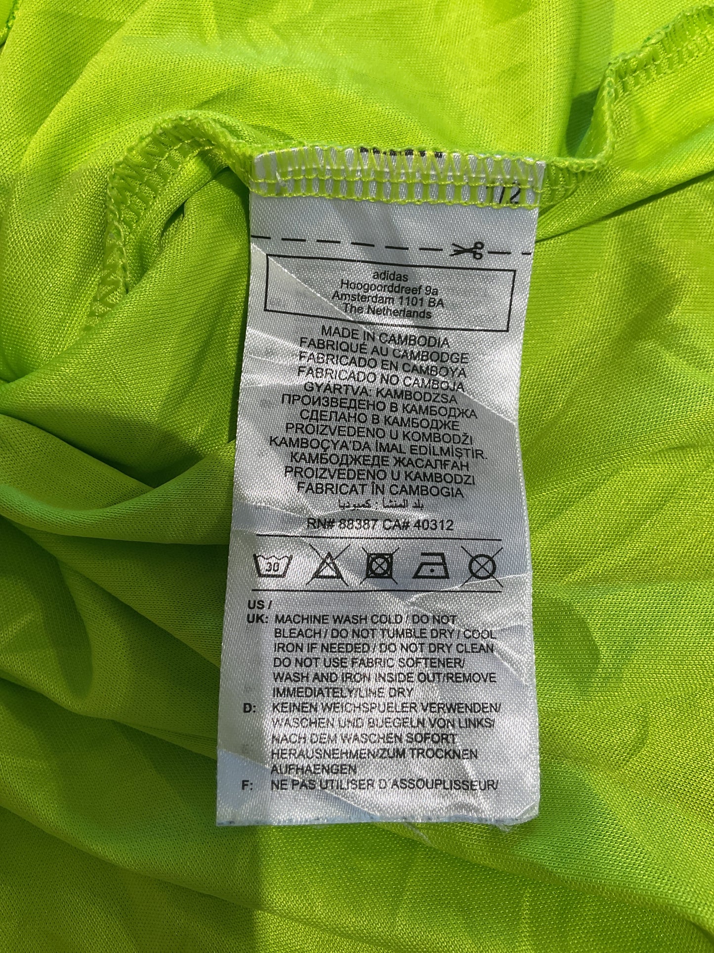 Close-up of a label on bright green fabric