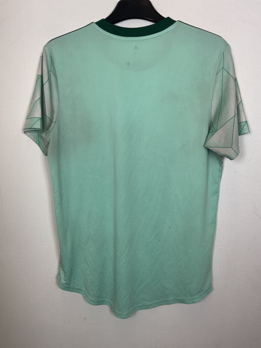 Green Adidas Atlanta United away jersey on a white background