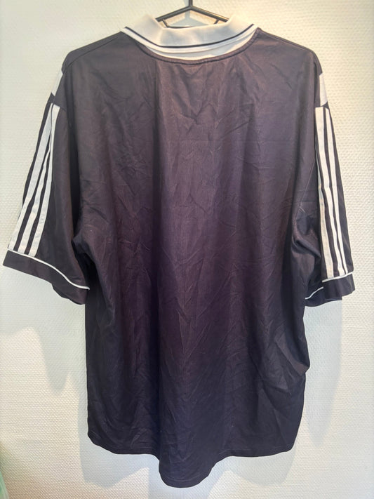 Front view of the retro Bordeaux 00/01 home shirt showing the Ligue 1 club badge and sponsor, shown in full front detail