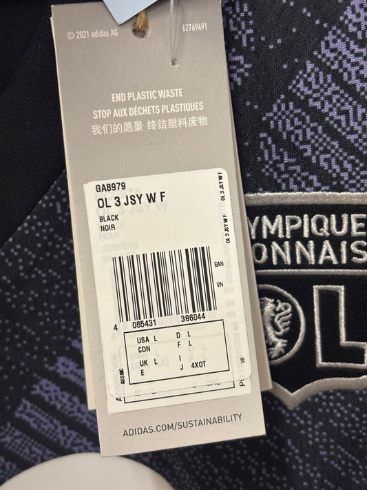 Collar and neckline detail on the Olympique Lyonnais 2022/23 women's fit third football shirt, photographed at our Stavanger store