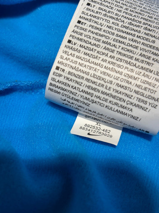 Side view of the Nike Barcelona 2018 anthem jacket showing the sleeve and zip detailing, photographed at our Stavanger store