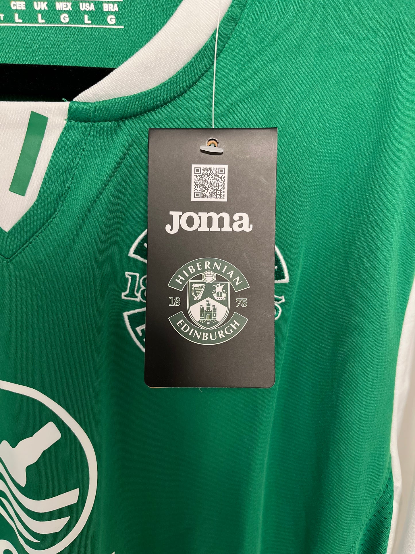 Green Hibernian classic football shirt with a Joma label and logo