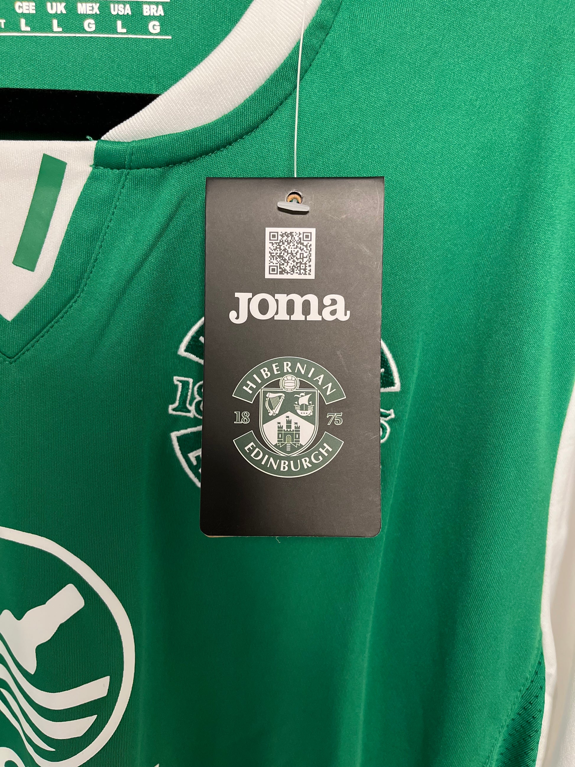Green Hibernian classic football shirt with a Joma label and logo
