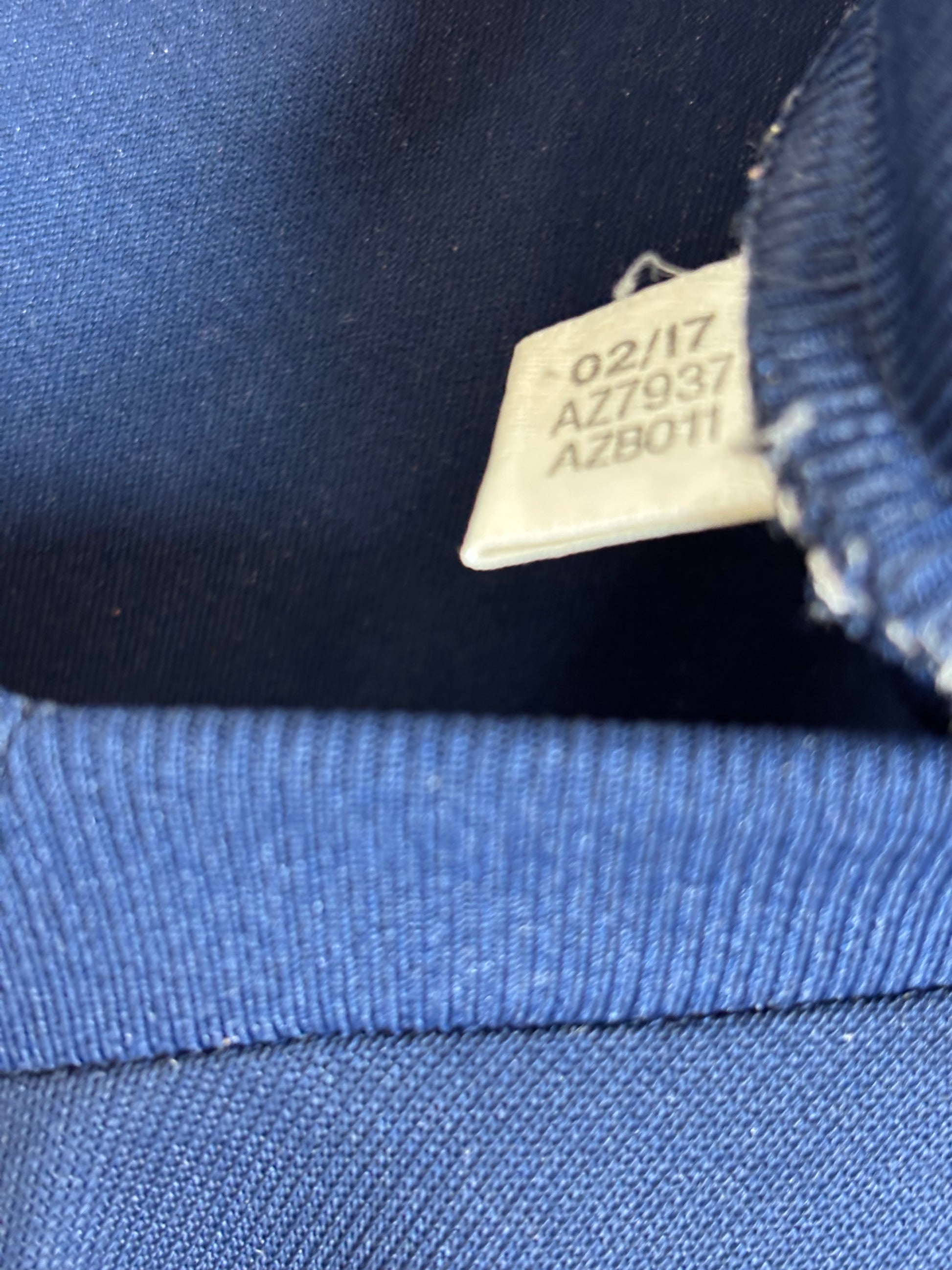 Detail view of T-Mobile sponsor logo on front of Bayern Munich 17/18 away shirt by Adidas