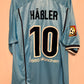 Blue football jersey with 'Häbler' and number '19' on a beige background