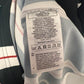 Manchester United 2023/24 away shirt sponsor logo and sleeve detail in size L