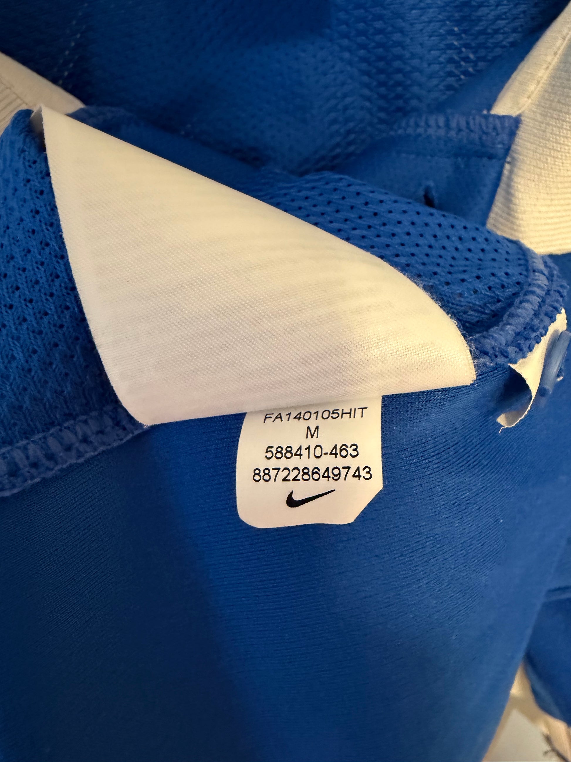 Interior size M label and Nike manufacturing tags visible inside Molde FK 2014 home shirt
