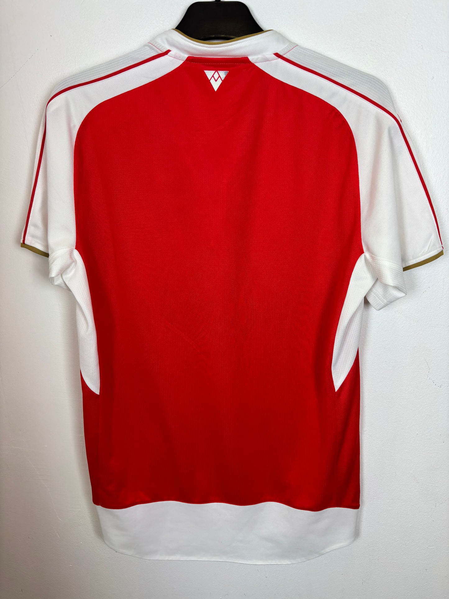 Back view of Puma Arsenal home shirt 2015/16 showing red and white design details