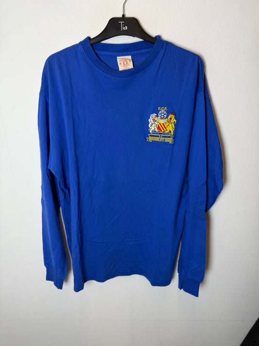 Manchester United 1968 European Cup Final retro shirt in blue, long sleeve, front view with club crest