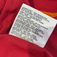 Sleeve detail showing Kappa logo and fabric texture of AS Roma 08/09 home shirt in red with yellow trim
