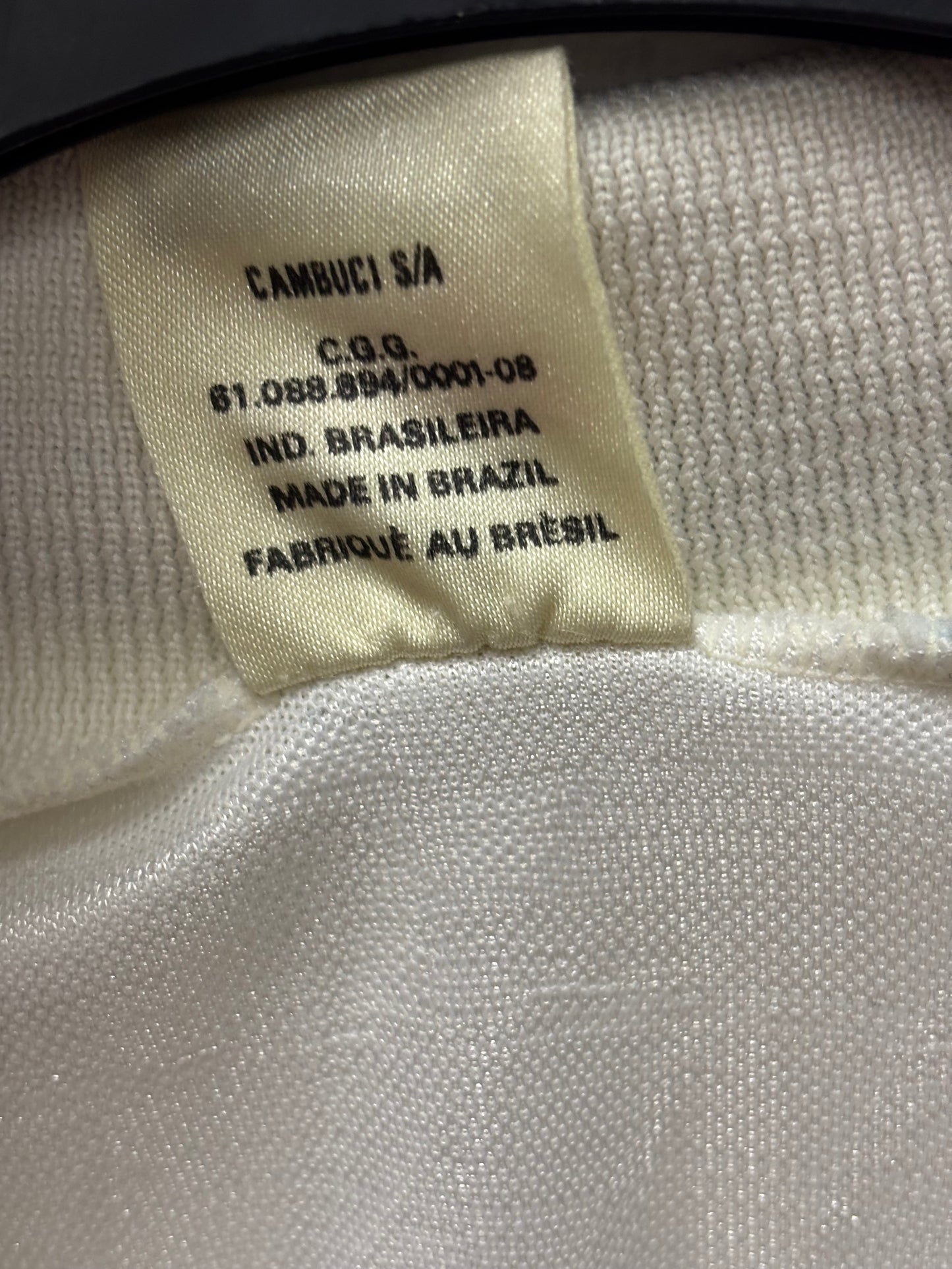 Close-up of a label on a Grêmio away 1992 vintage shirt with text