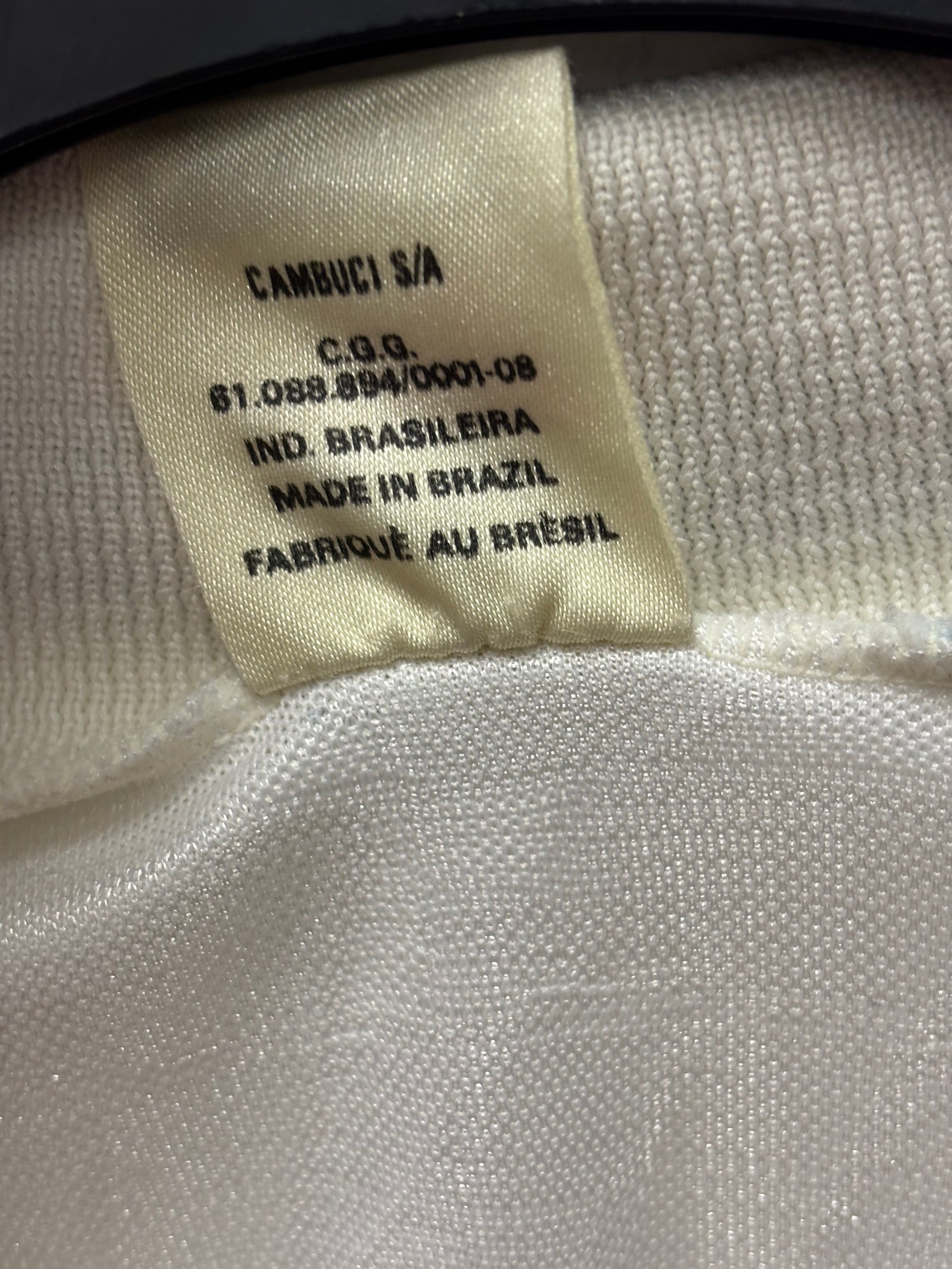 Close-up of a label on a Grêmio away 1992 vintage shirt with text