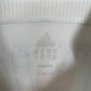 German Football Association eagle badge and Adidas three stripes logo on 2006 World Cup home shirt