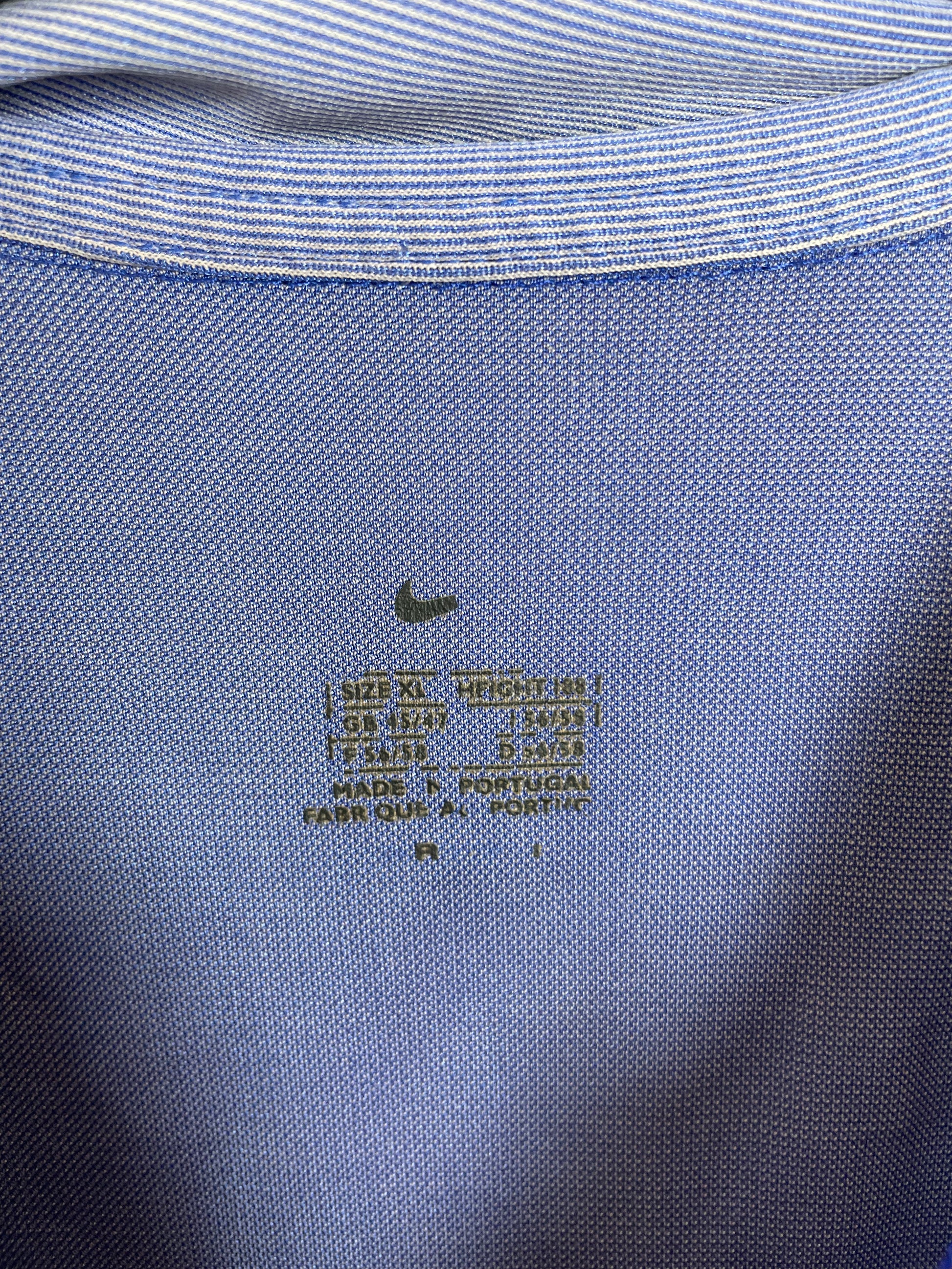 Close-up of Netherlands national team crest and Nike logo on orange 00/02 away shirt