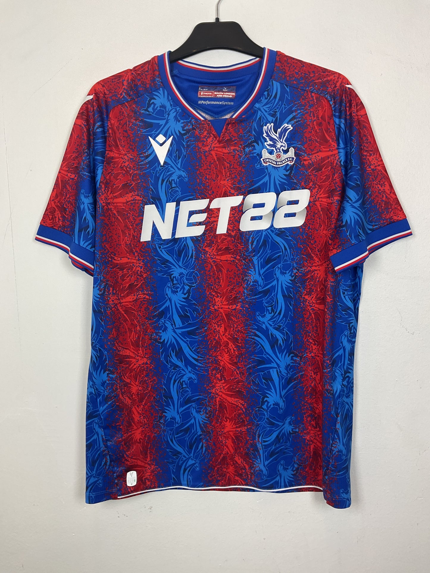 Blue and redpremier league t shirts with visible branding on a light gray background