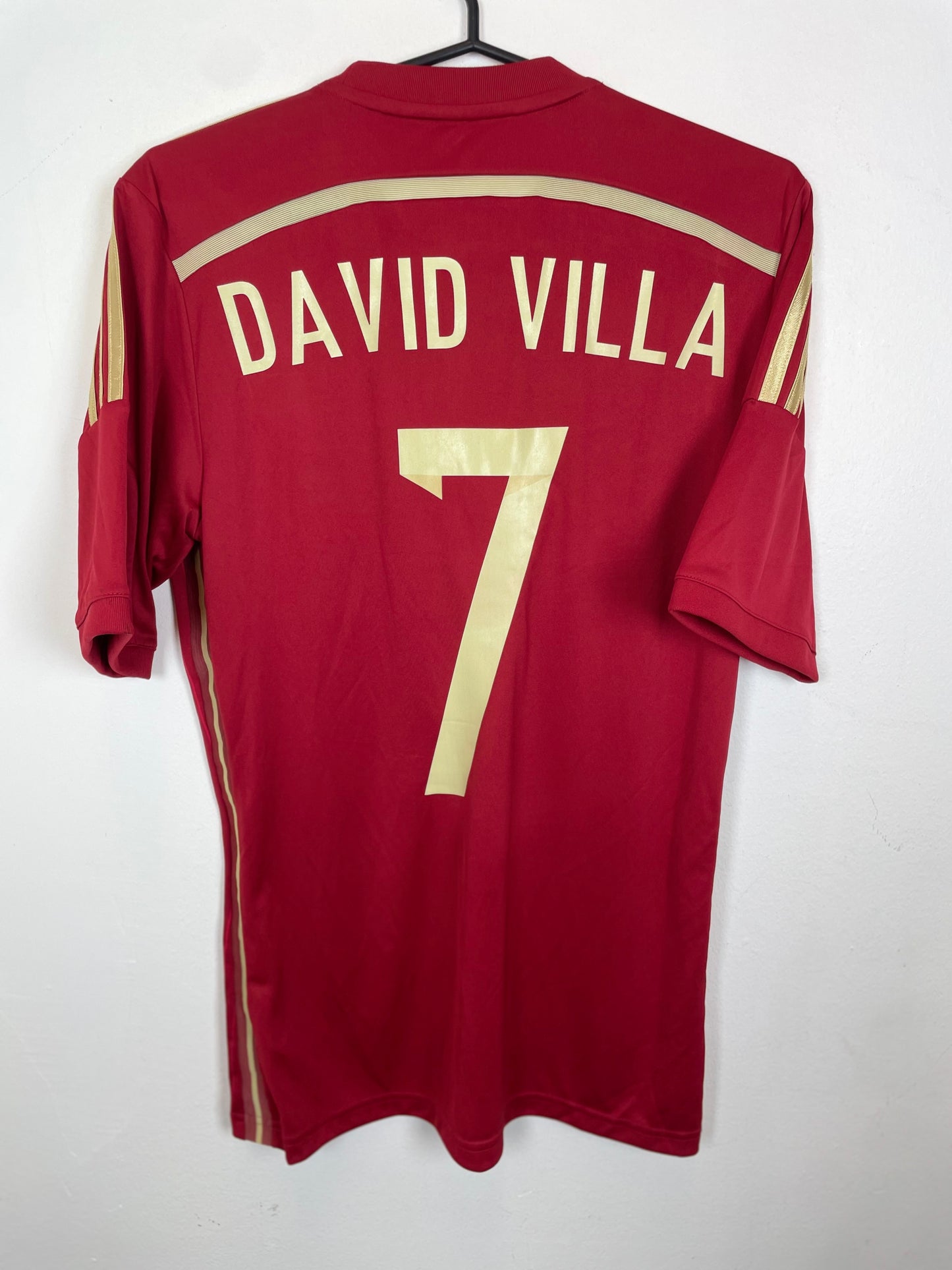 Rear view of Adidas Spain 2014 home jersey displaying Villa name and number 7 print