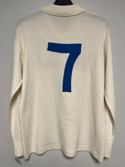 White long-sleeve napoli 80s football shirt with a blue number 7 on a gray background
