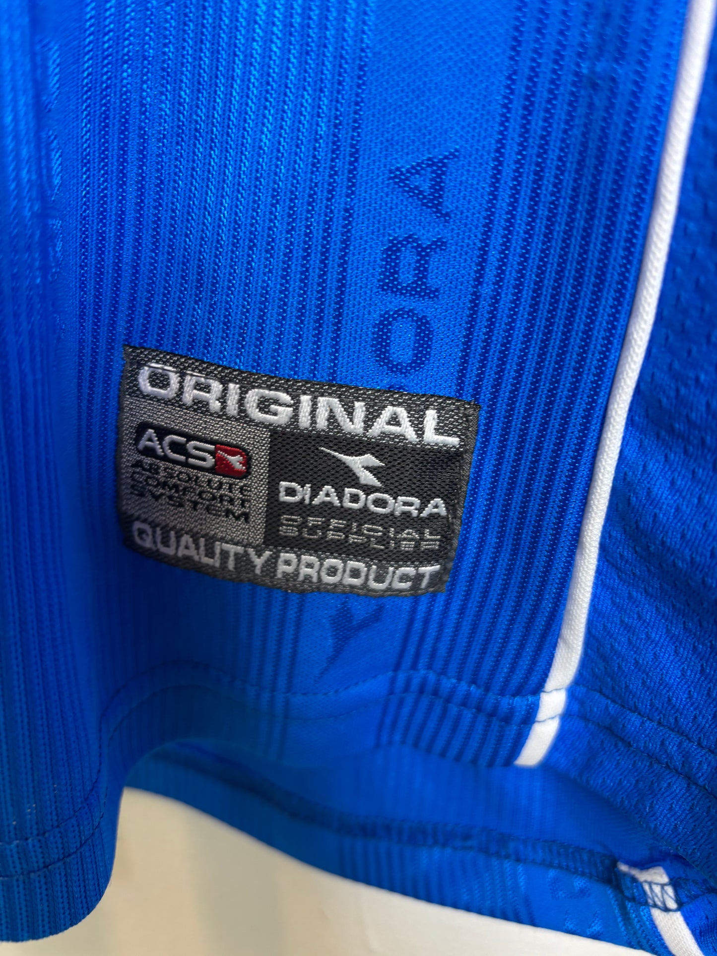 Sky blue Napoli 2000/01 home shirt sleeve details and Diadora branding on vintage jersey