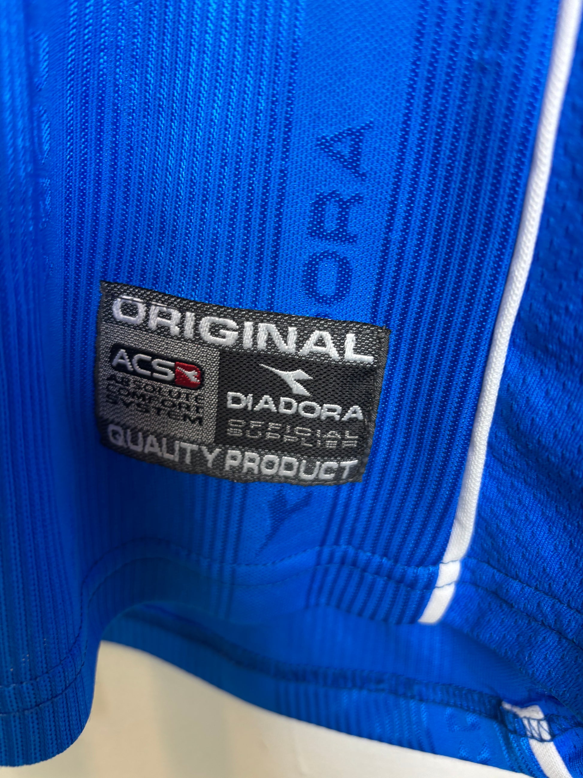 Sky blue Napoli 2000/01 home shirt sleeve details and Diadora branding on vintage jersey