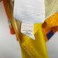 Nike size tag and fabric care label detail on Barcelona 12/13 Messi away shirt XXL