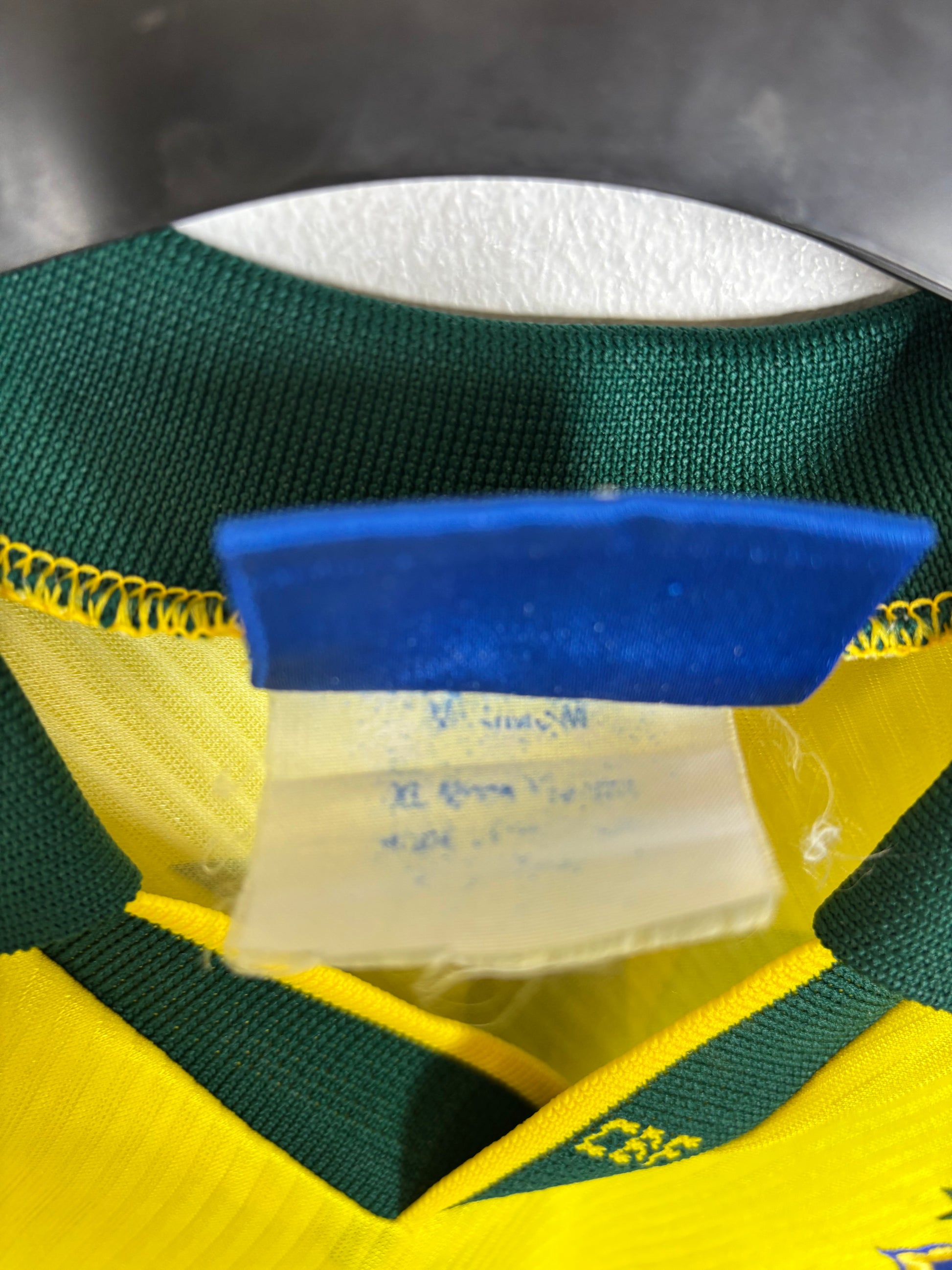 Interior label and size tag showing authentic Umbro Brazil 1996 home shirt details XL