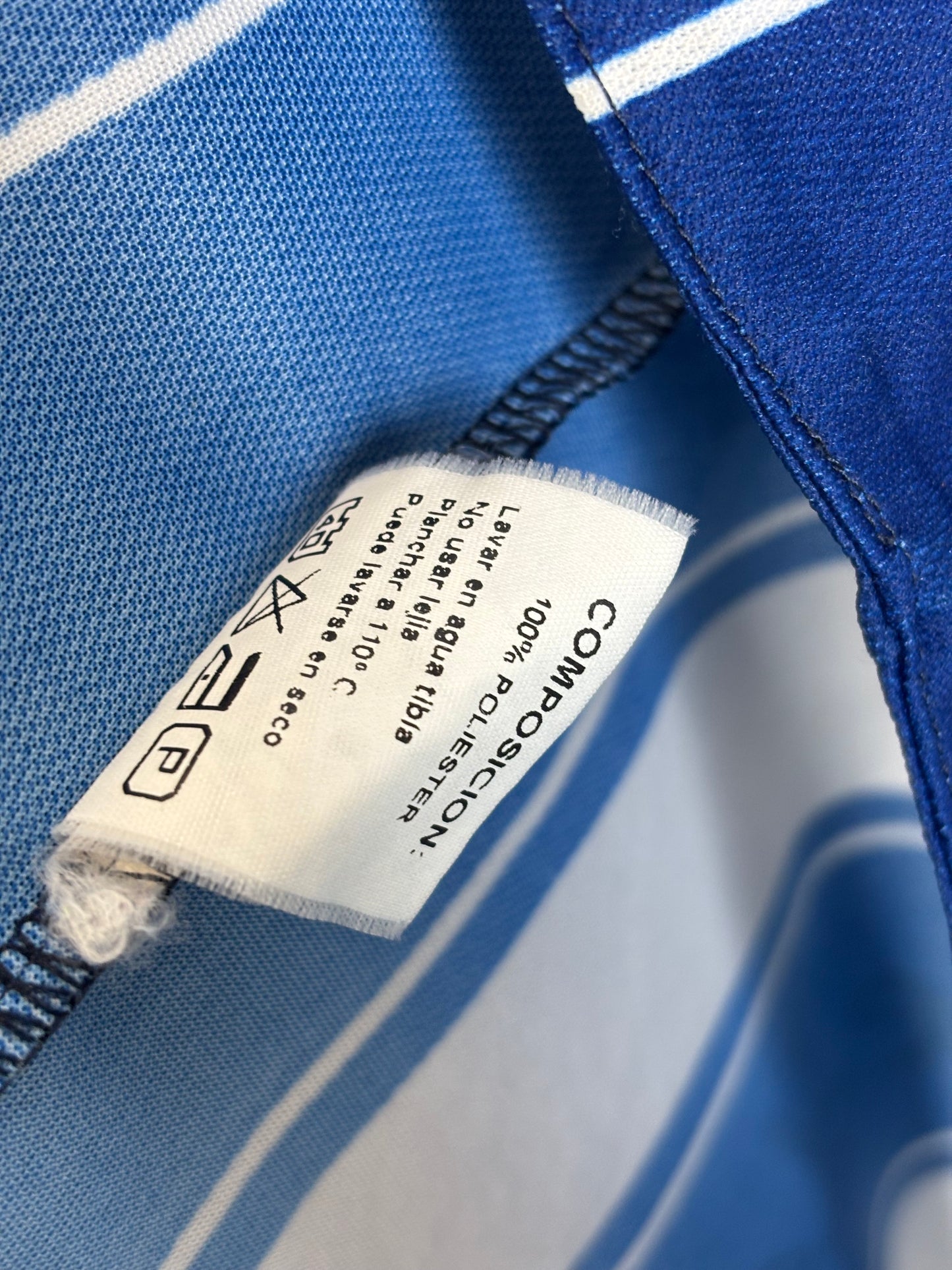 Side profile view of white Astore Real Sociedad 2000/01 home jersey highlighting fit and construction quality