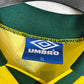 Close-up of Brazil national team crest and Umbro logo on yellow 1996 home jersey