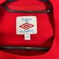 Close-up of England away shirt 2010/11 showing Three Lions badge and technical fabric details