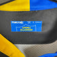 Close-up of APOEL FC club badge and Macron logo detail on 2019/21 away shirt