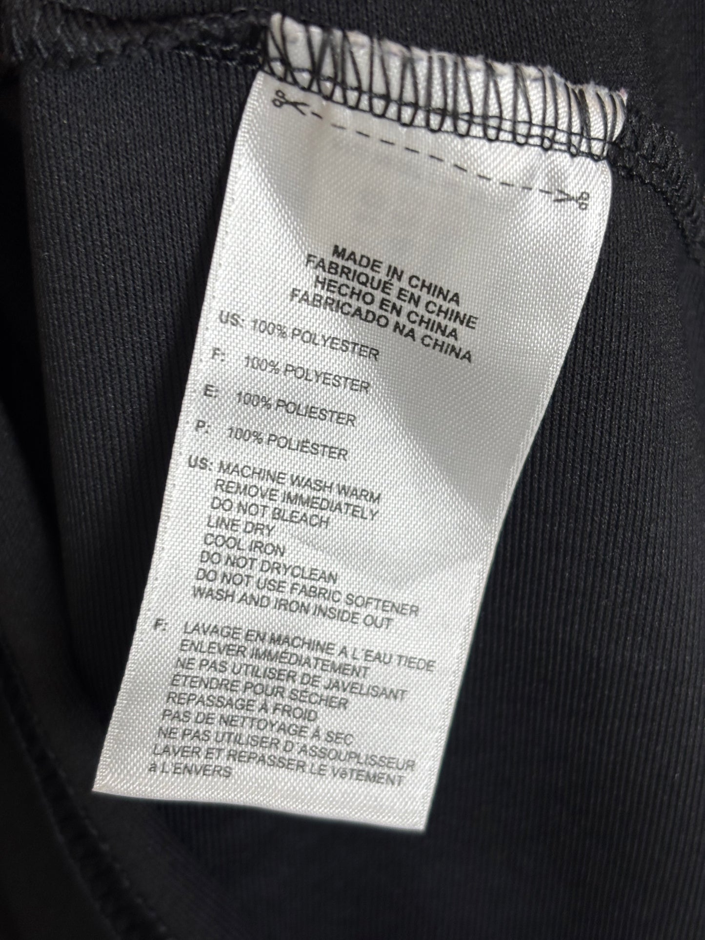 Germany 2010 away shirt size and care label details showing Adidas branding and fabric information