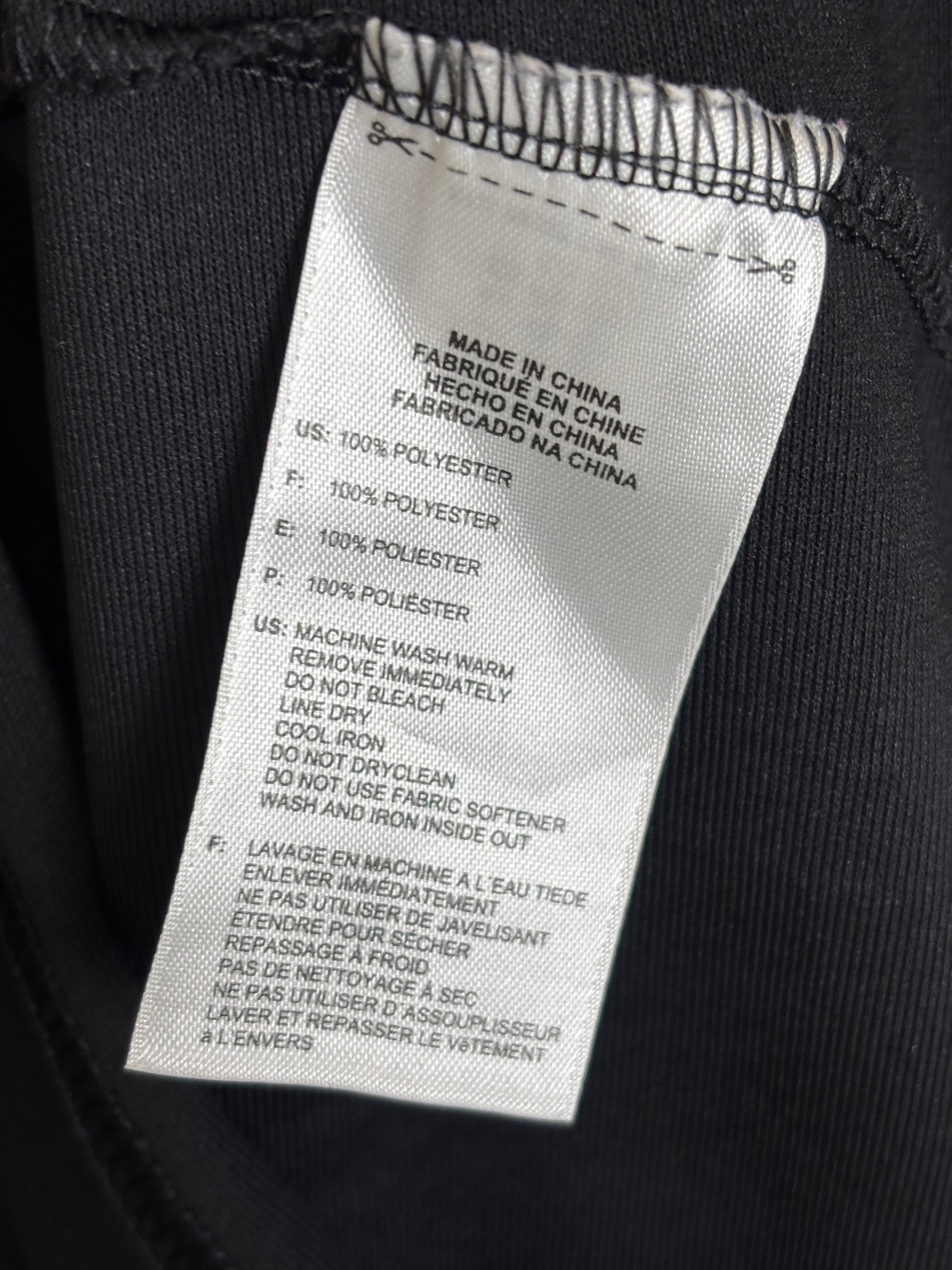 Germany 2010 away shirt size and care label details showing Adidas branding and fabric information