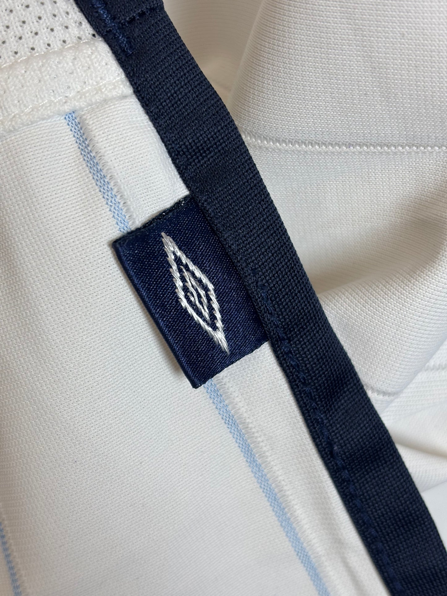 Umbro England 03/05 home shirt size and care label detail showing Large fitting