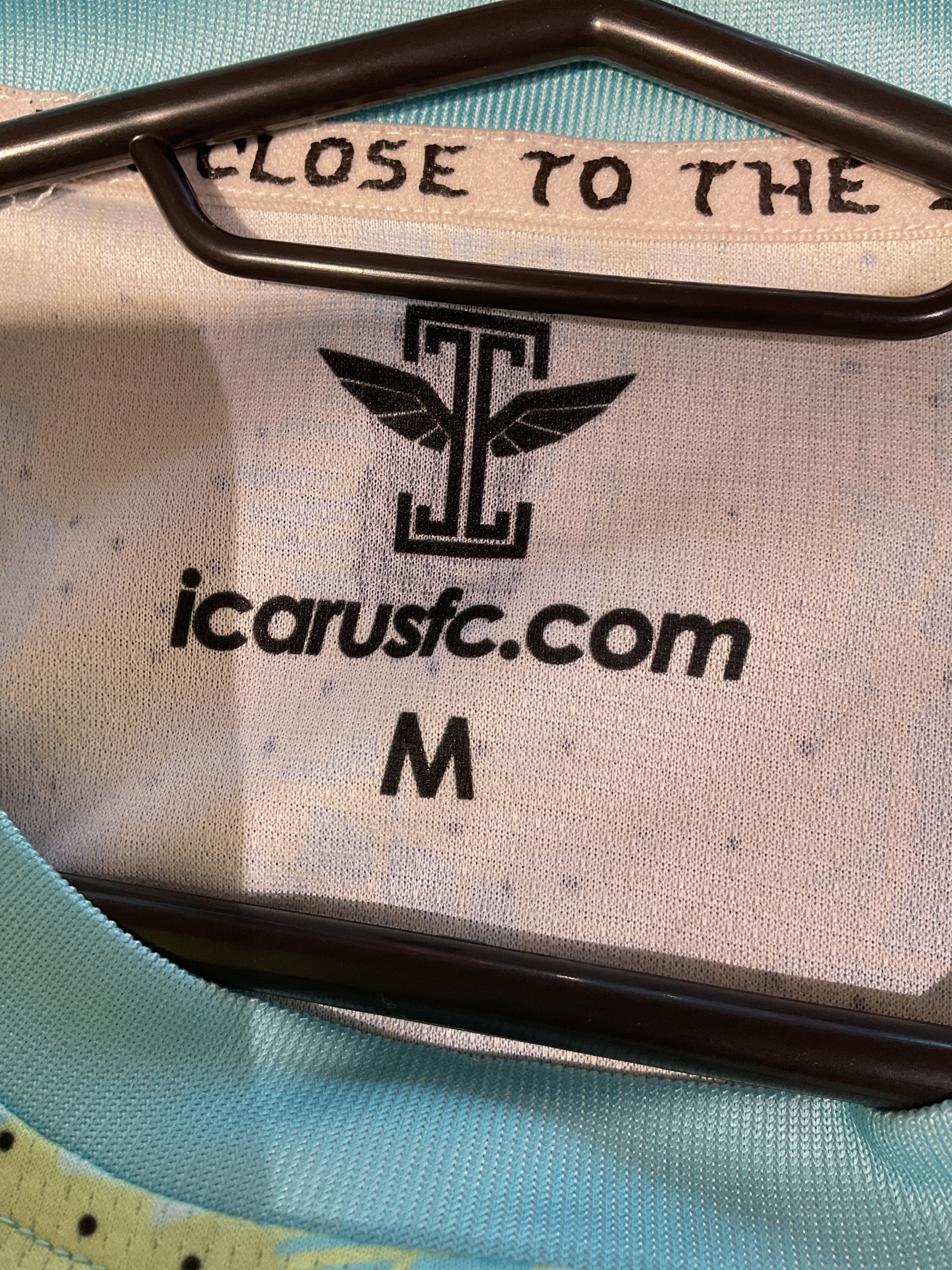 Close-up of New Amsterdam third kit 21/22 shirt badge and logo details in size M