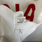 Under Armour Tottenham 2014/15 home shirt interior label showing size M and authenticity tags