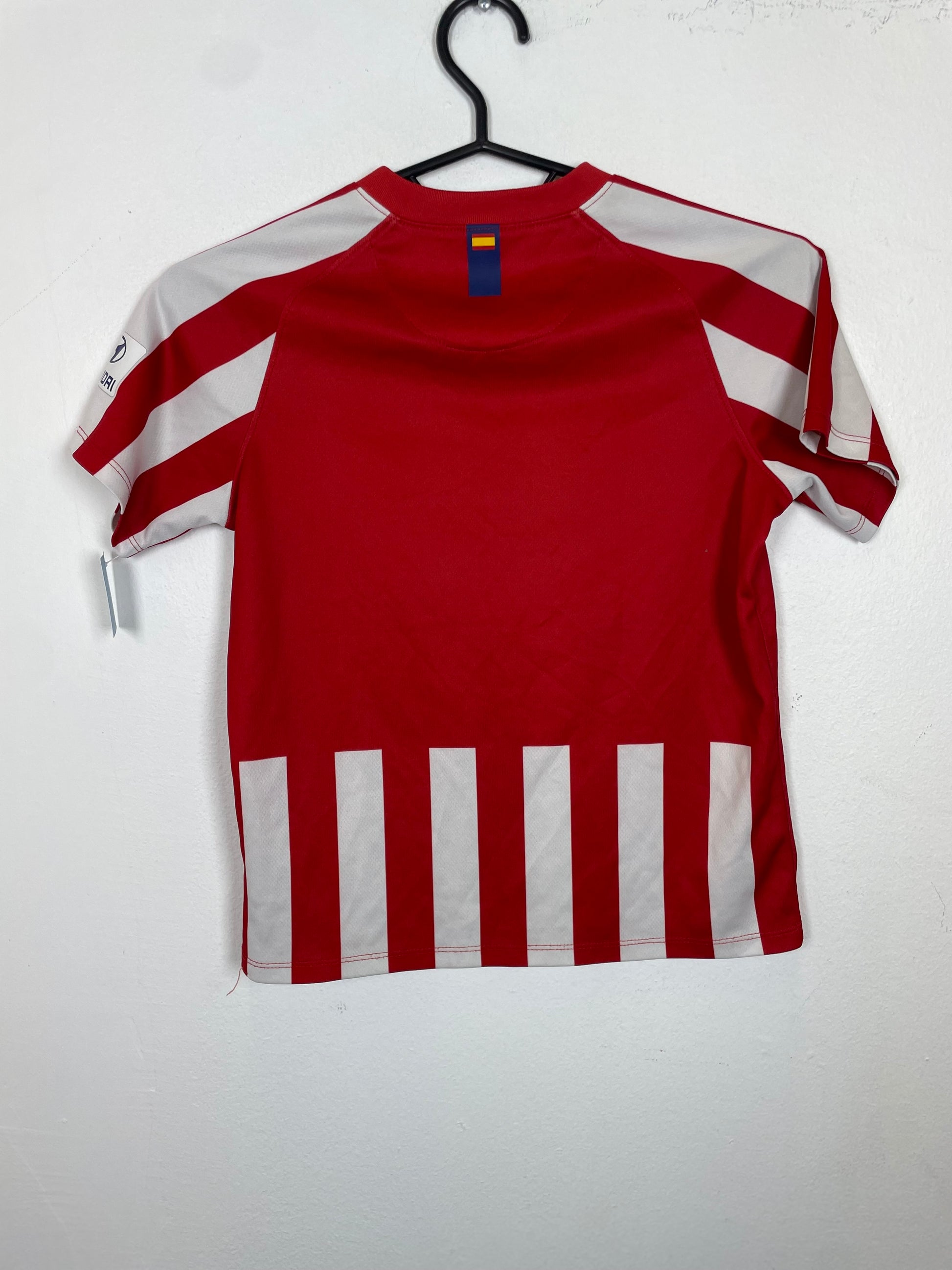 Back view of Atletico Madrid home shirt 19/20 kids size 122-128cm showing red and white stripes