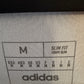 Close-up of River Plate club crest and Adidas three stripes logo on 2025 fourth jersey