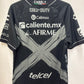 Black  Club Tijuana call of duty shirt with various logos on a light background