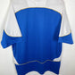 Blue and white Wigan Athletic Home 06/07 jersey on a hanger against a white background