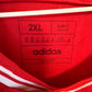 Ajax 2023/24 home shirt sponsor logo and sleeve detailing on Henderson 6 jersey