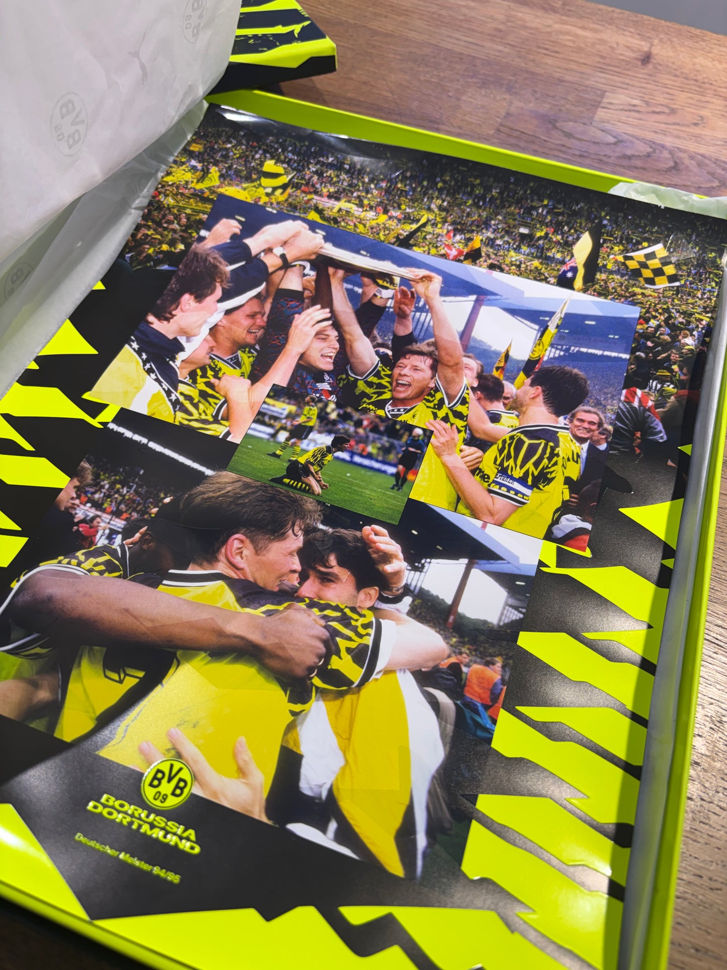 Flat lay presentation of Puma Borussia Dortmund 24/25 Ryerson 26 boxed commemorative home shirt