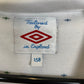 Close-up of Umbro logo and England national team crest on white 2010 home shirt with Terry 6