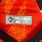 Close-up of Kelme brand logo and Nakhon Ratchasima FC club badge on 2021/22 shirt