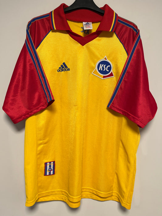 Yellow and red Karlsruher jersey with Adidas logo on a neutral background