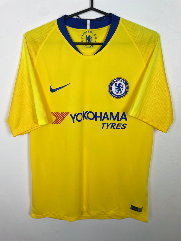 Yellow Chelsea Away 18/19 Higuain 9 shirt with Nike and Yokohama Tyres logos on a hanger against a white background