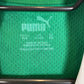 Close-up of Plymouth Argyle club badge and shirt details on 2024/25 Randell 20 kids jersey
