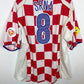 Red and white checkered sports jersey with 'SrinA' and number '8' on a white background
