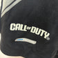 Black glove with 'Call of Duty' branding on a light background