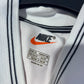 Close-up of Poland national team eagle crest badge on Nike 1998 home football shirt